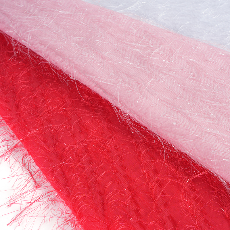 Tkanina Uragiri z cekinowymi frędzlami i kwiatami ciętymi 75D