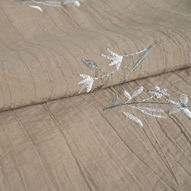 Tkanina marszczona w kształcie kwiatu i haftu w brzoskwiniową orchideę