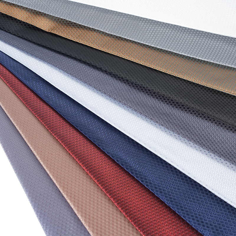 Mały żakard poliestrowy w kropki w romby