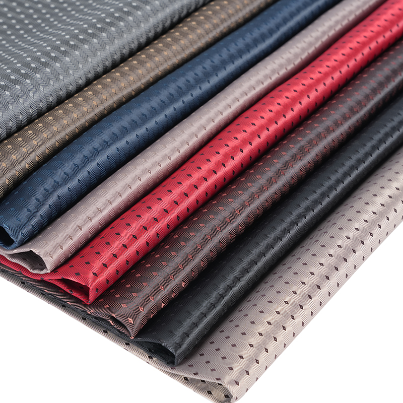 Tkanina PV w jodełkę o diagonalnym splocie, z małą siatką w kształcie rombu